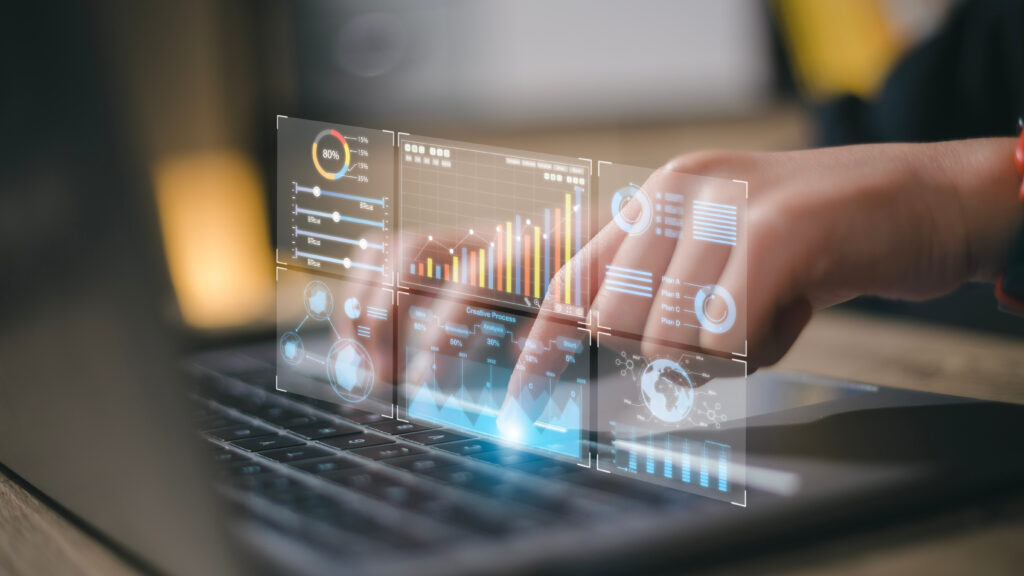 Data analyst working on business analytics dashboard with charts